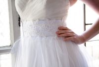 Wedding dress with a sash