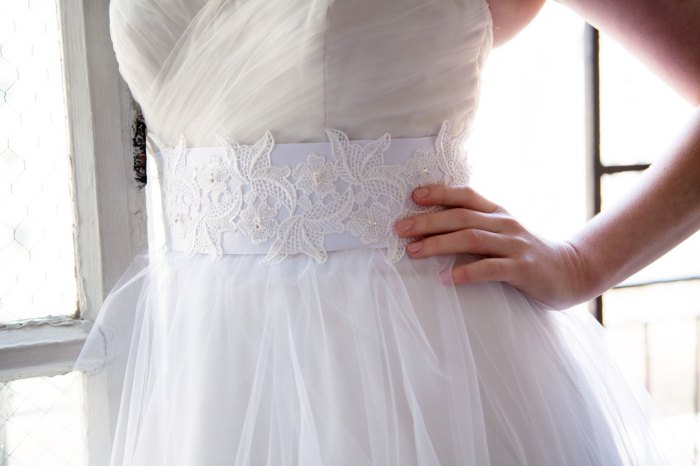 Wedding dress with a sash